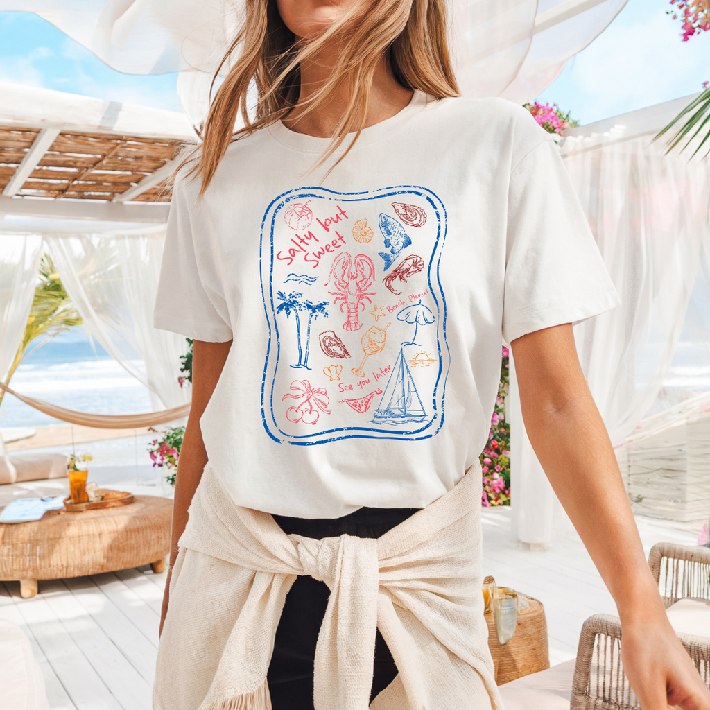Camiseta casual de corte holgado con cuello redondo, manga corta, 100% Algodón, con gráfico de Figuras de Playa. Perfecta para el estilo diario.